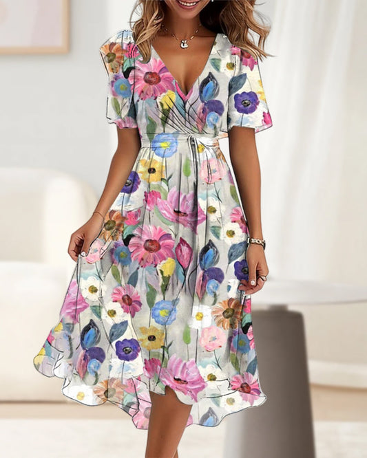 Elegantes kleid mit buntem blumendruck und v-ausschnitt