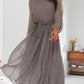 Elegantes Kleid mit Tupfenmuster