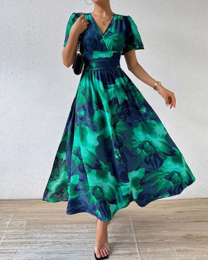 Elegantes Swingkleid mit V-Ausschnitt und Blumendruck